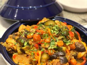 A tagine with chicken and vegetables, saffron and herbs.