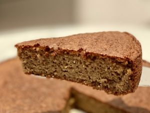 A slice of coconut yogurt and almond cake, which is really good for gut health.