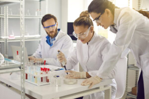 Group of Genetics scientists working in science laboratory. 