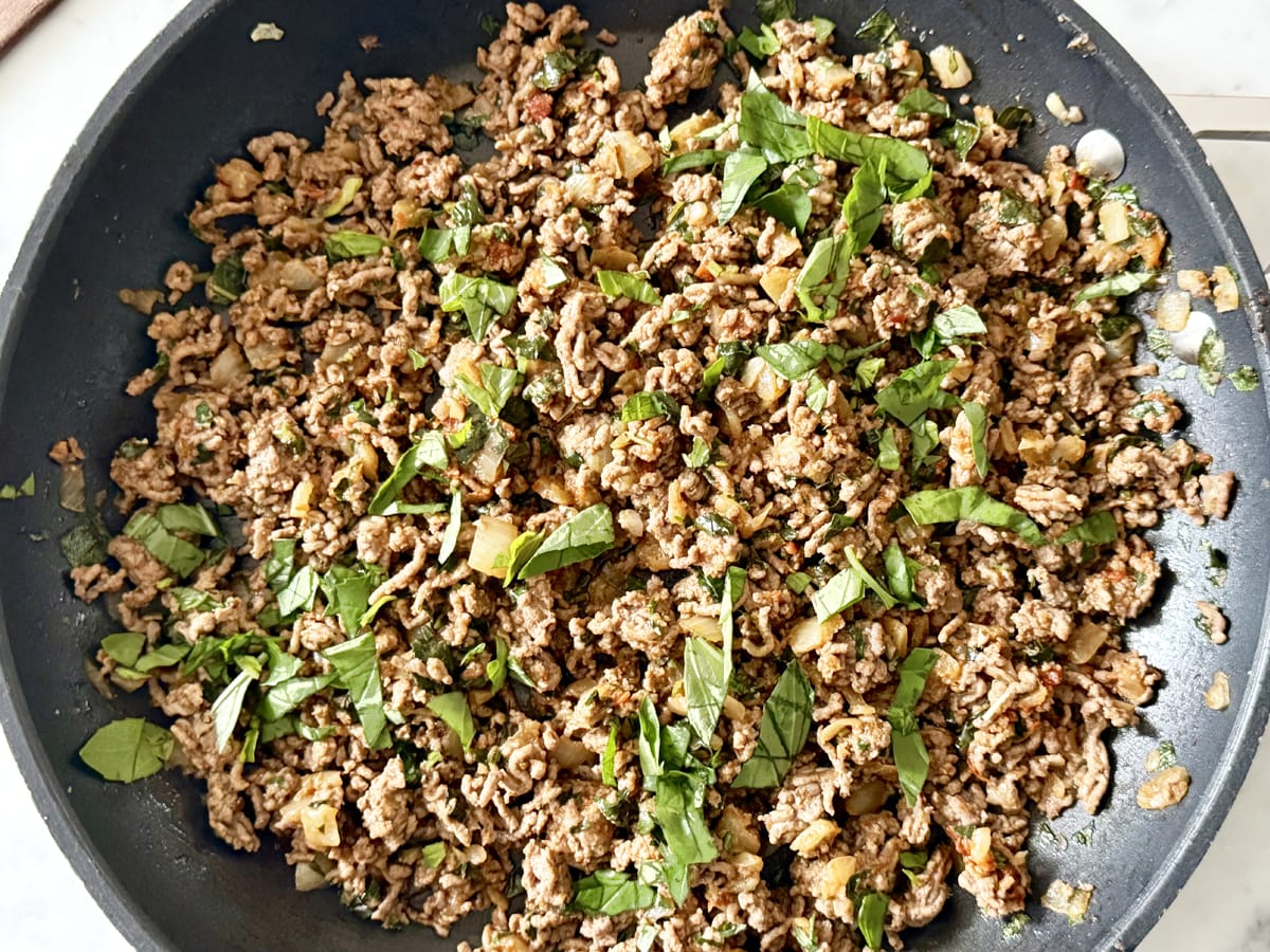 Basil Ground Beef garnished with fresh basil