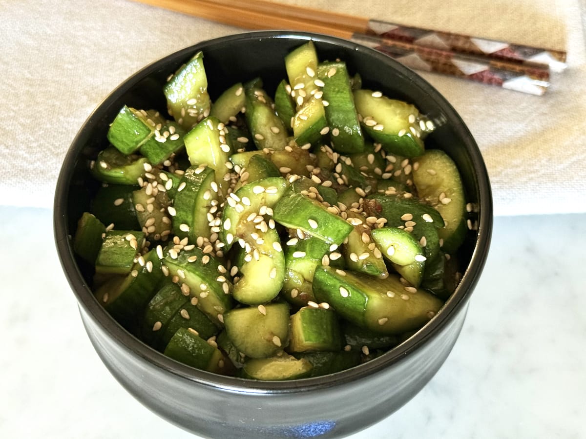Chinese Smashed Cucumber Salad decorationed with sesame seeds