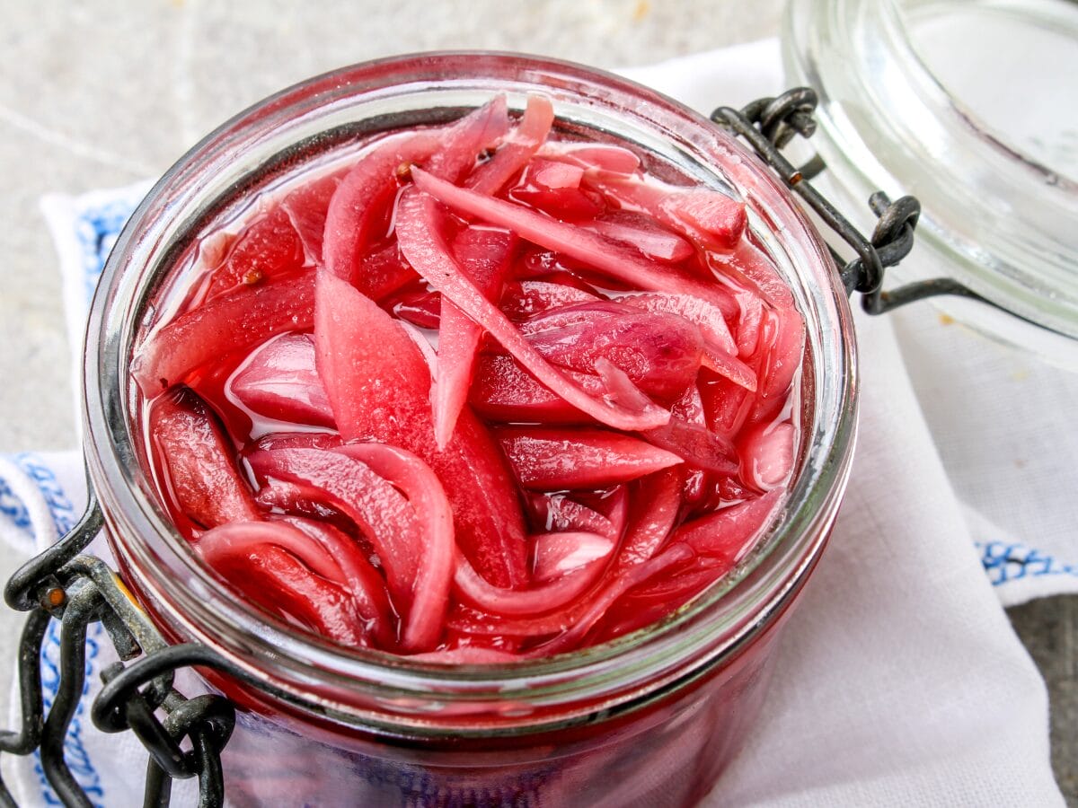a jar of pickled red onions