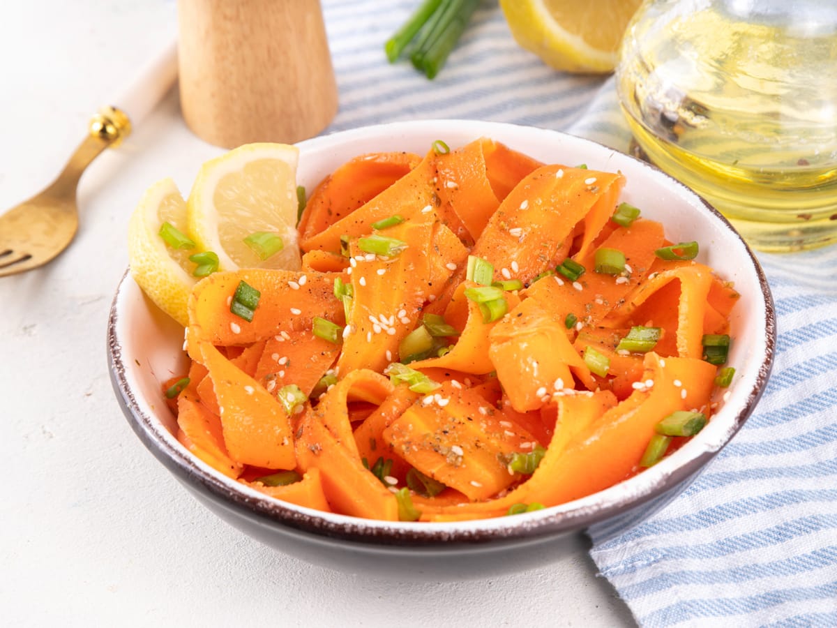 Retinol Carrot Salad garnished with scallions and sesame seeds